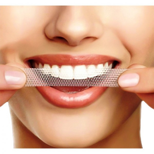 Rủi ro khi lạm dụng miếng dán trắng răng- Ảnh 2.