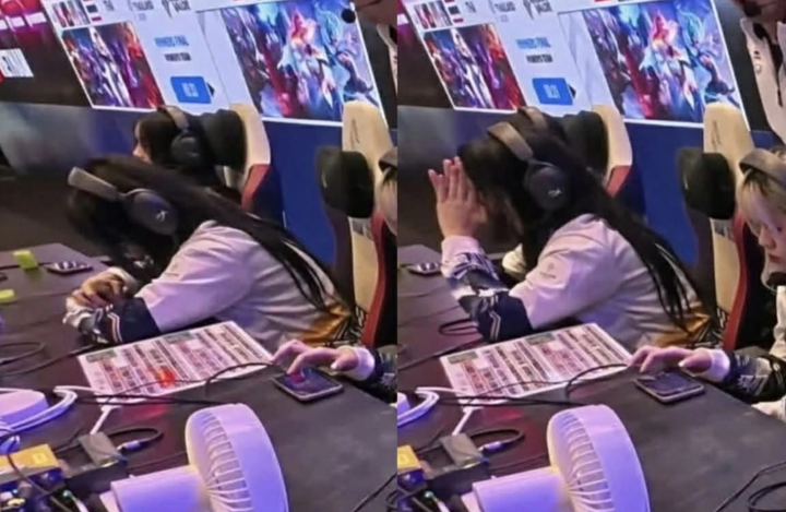 Biểu hiện bất thường của Naraphat Warasin như đang cố che màn hình.