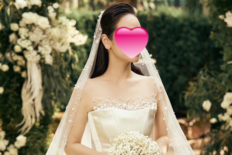 'Phú bà Vbiz' bất ngờ diện váy cưới sau khi ly hôn, tò mò danh tính chú rể