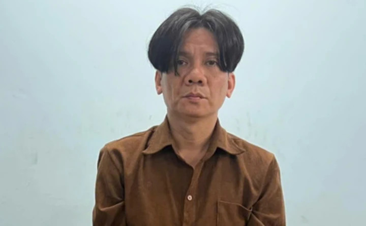 Nguyễn Quốc Huy tại cơ quan điều tra. (Ảnh: Công an TP.HCM)