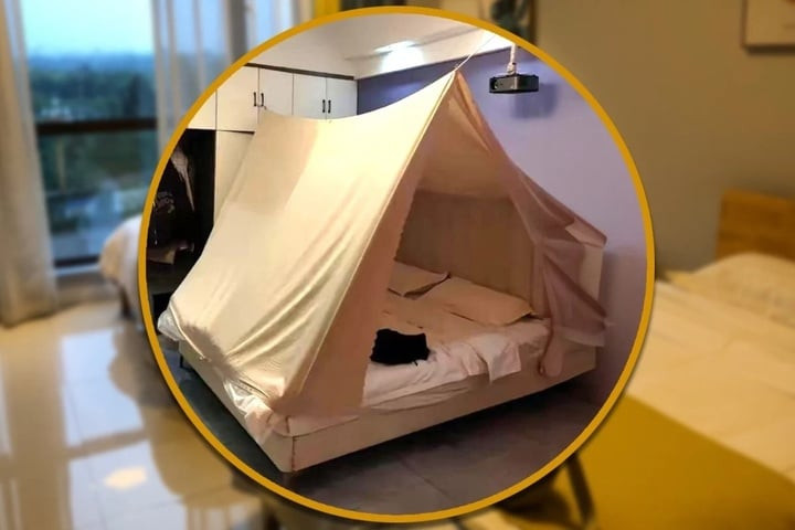 Lo sợ camera quay lén trong khách sạn, người phụ nữ dựng lều tạm che chắn giường. (Ảnh: Baidu)