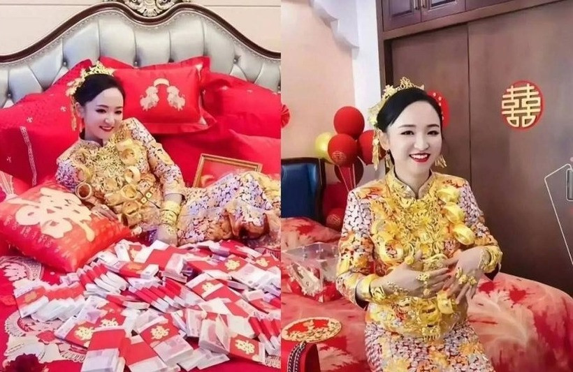 Bên cạnh cô dâu chất đống hàng xấp tiền dày cộp, mỗi tờ trị giá 100 NDT (hơn 352.000 đồng). Ảnh: Weibo.