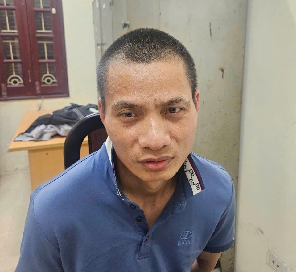 nhung hinh anh ve viec bat giu nghi pham cuop ngan hang o ha noi hinh anh 1