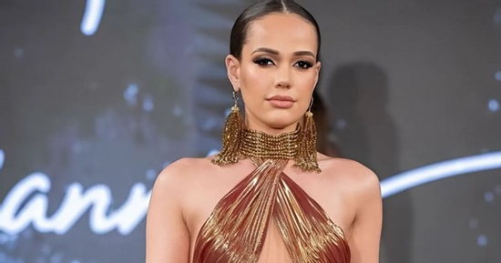 Nữ phóng viên cao 1,75 m là đối thủ của Ý Nhi