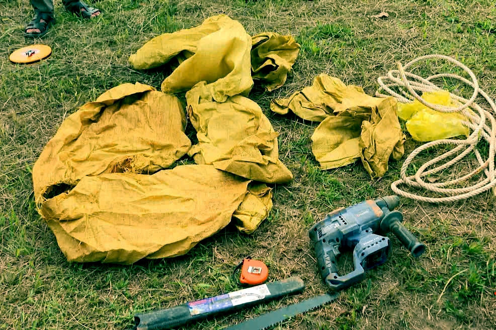 a3Hai đối tượng người Trung Quốc đã đào.jpg