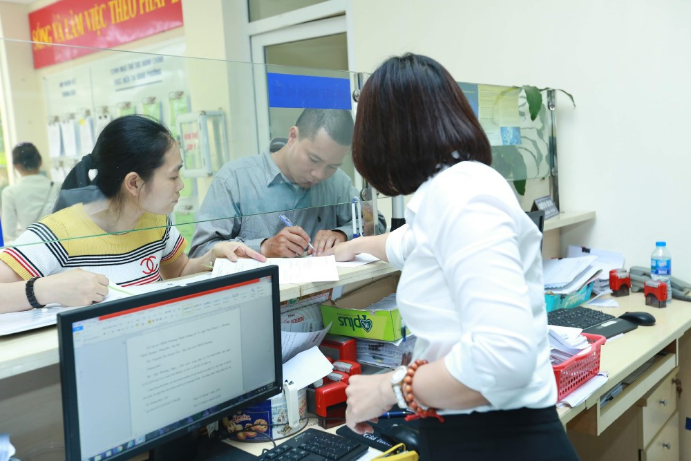 Sáp nhập tỉnh, thành người dân không phải làm lại giấy tờ? - Ảnh 2.