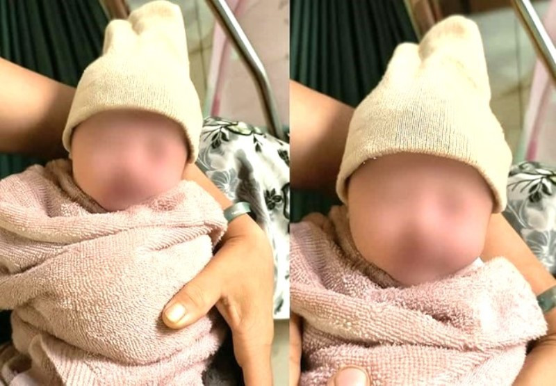 Bé gái sơ sinh bị bỏ rơi trước kho hàng.jpg