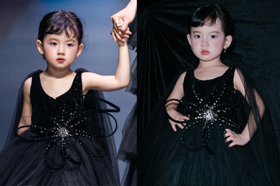 Mẫu nhí gây sốt khi đầm đen đính đá pha lê tại show thời trang nối tiếng