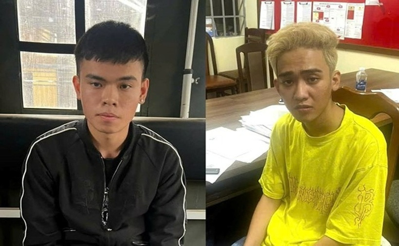 Hai thanh niên giả danh nhân viên ngân hàng, lừa đảo Việt kiều gần 1 tỷ đồng. (Ảnh: Lao động)