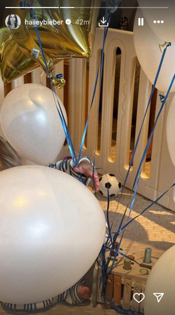 hailey bieber celebrates justins 1