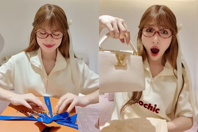 Hòa Minzy xách túi gần 200 triệu chủ tịch tặng vi vu nước Nga