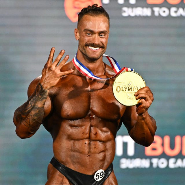 chris bumstead celebrates winning the classic physique news photo 1674808959 1768227347214502915151