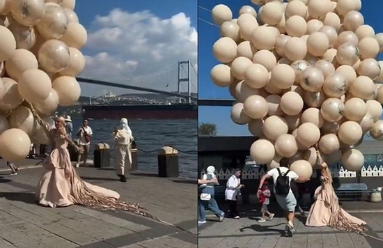 Đang tạo dáng cùng chùm bóng khổng lồ, cô dâu không ngờ gặp phen 'hú vía'