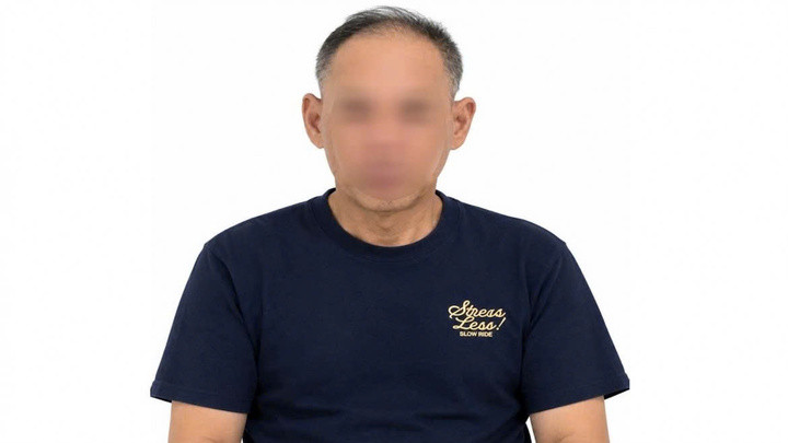 Lê Văn Hoài tại cơ quan công an bị tạm giữ vi hành vi gây rối trật tự công cộng