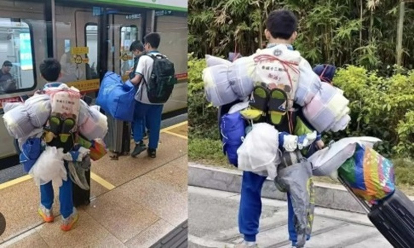 Nam sinh được cộng đồng mạng khen ngợi vì tự mình mang khối hành lý lớn buộc sau lưng khi về quê nghỉ Tết Nguyên đán. Ảnh: SCMP/Weibo