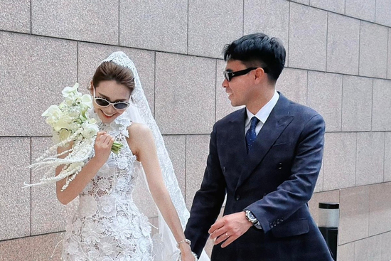 Ảnh cưới của MC Huyền Trang với cầu thủ Đức Huy