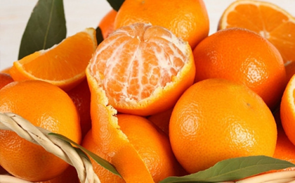 Công thức làm mặt nạ trắng da từ cam quýt dư sau Tết- Ảnh 1.