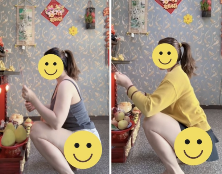 Người phụ nữ mặc áo sát nách, quần đùi ngắn thắp hương thần Tài.