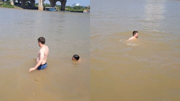 Anh Tây chịu thua cái nóng Hà Nội, đang cà phê 'chill' cũng xuống sông Đuống tắm