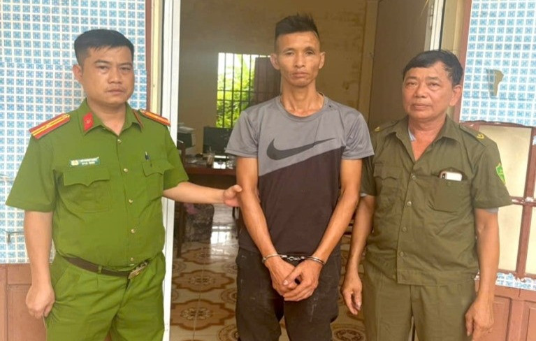 Đối tượng Đào Xuân Hải tại cơ quan Công an.jpg