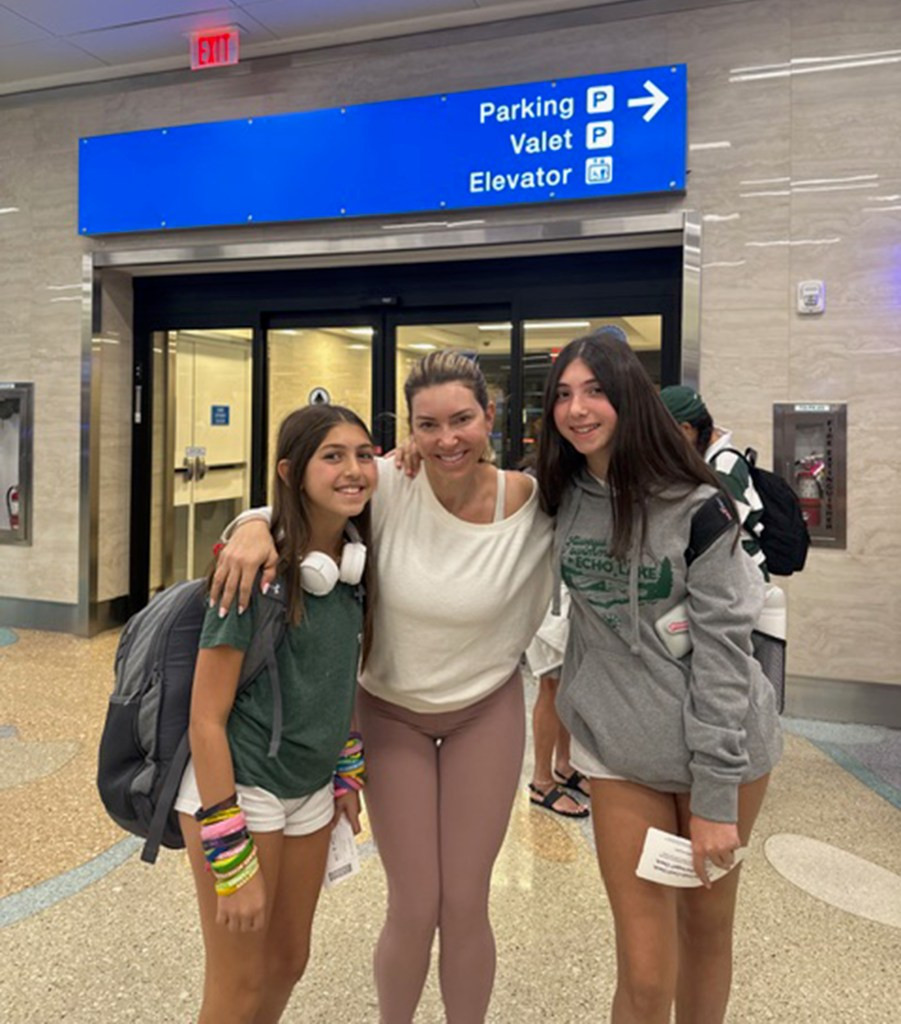 Rachael Braunschweiger Potash (Center) with her daughters, 13 and 15.