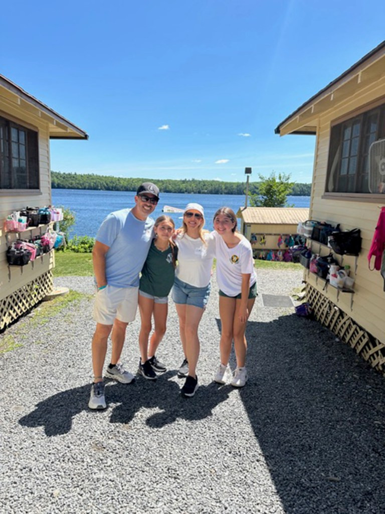Rachael Braunschweiger Potash (Right Center) with daughters and husband Adams.